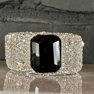 KENNETH JAY LANE crystal encrusted hinged cuff.